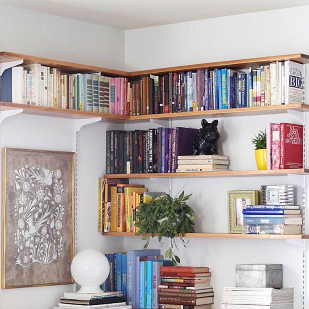 Corner shelves with colorful books
