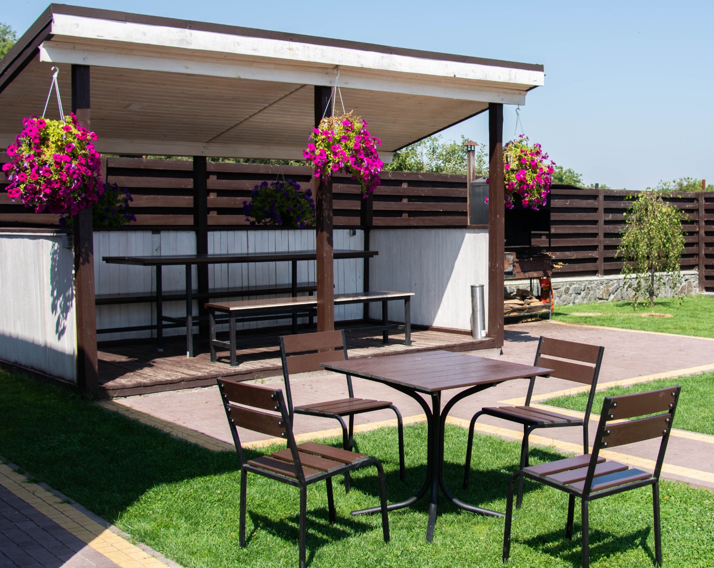 Backyard pergola with outdoor furniture