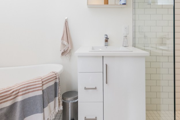 Bathroom with tub and sink