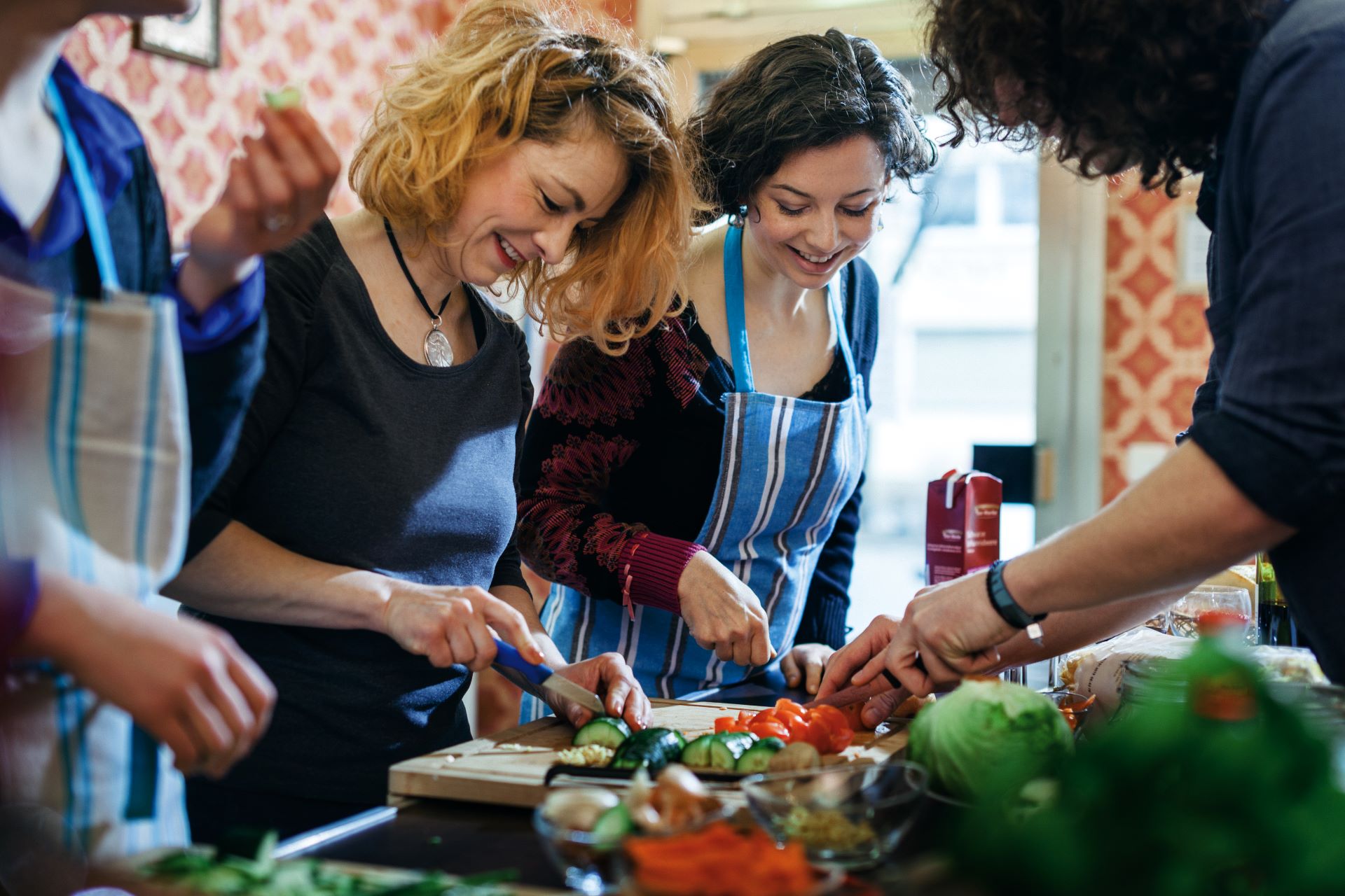 group of people cooking together