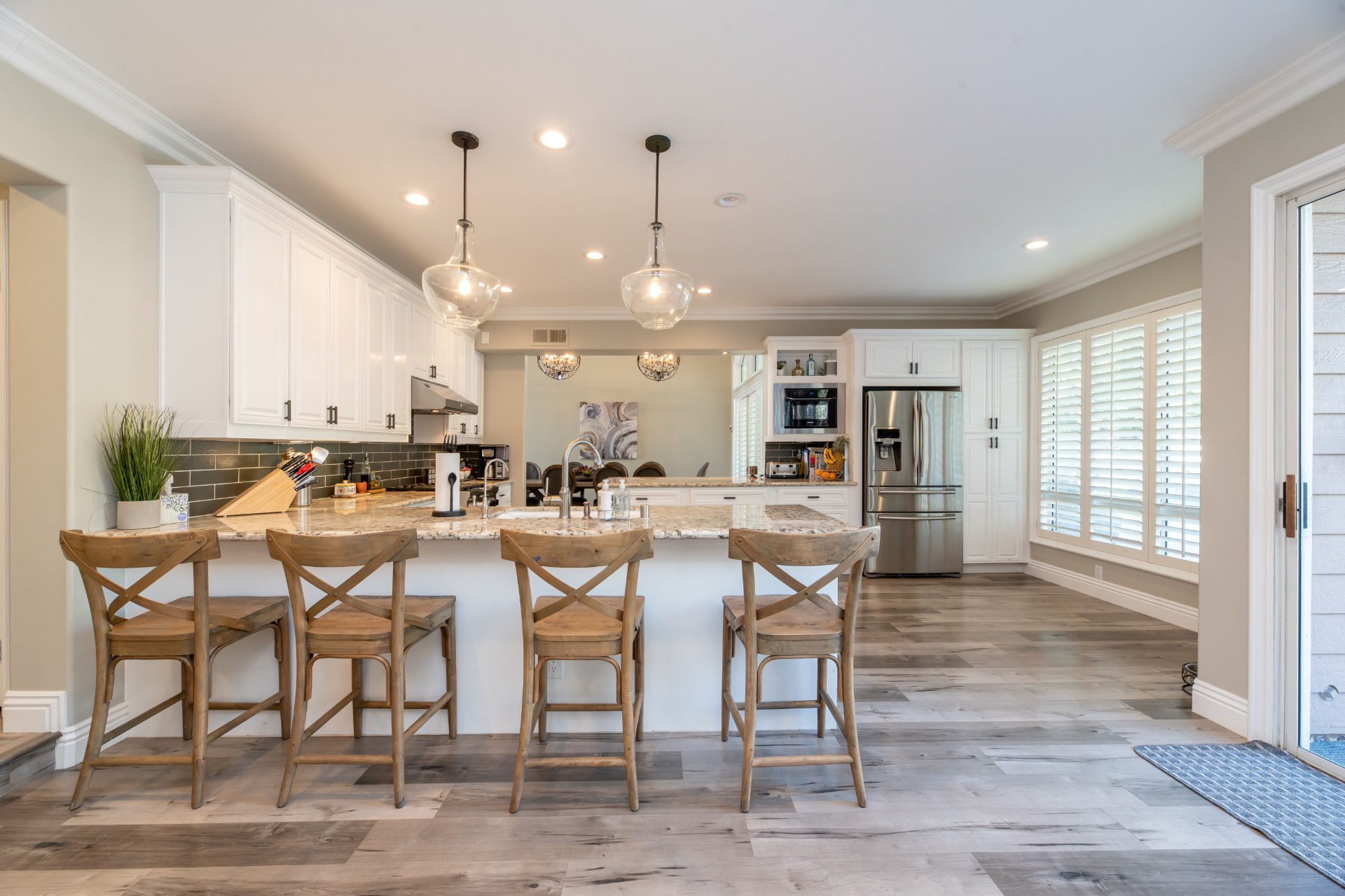 Kitchen island with wooden chairs