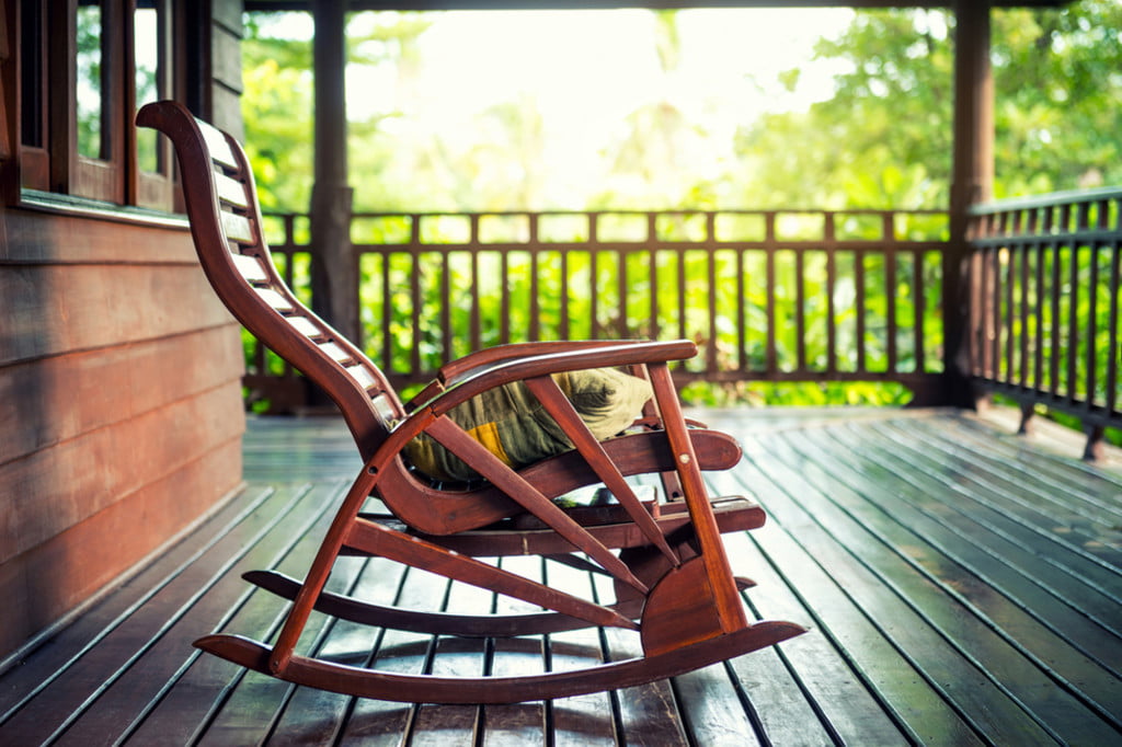 Porch glider on a front porch