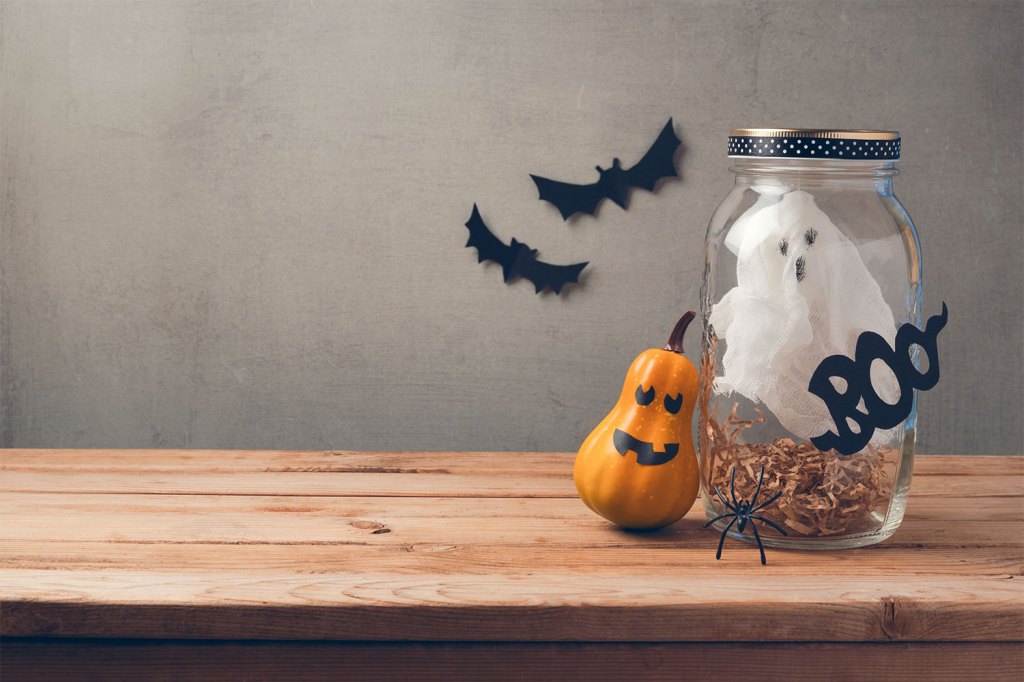 halloween decoration with bats and pumpkin