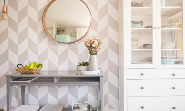 Geometric wallpaper with a console table