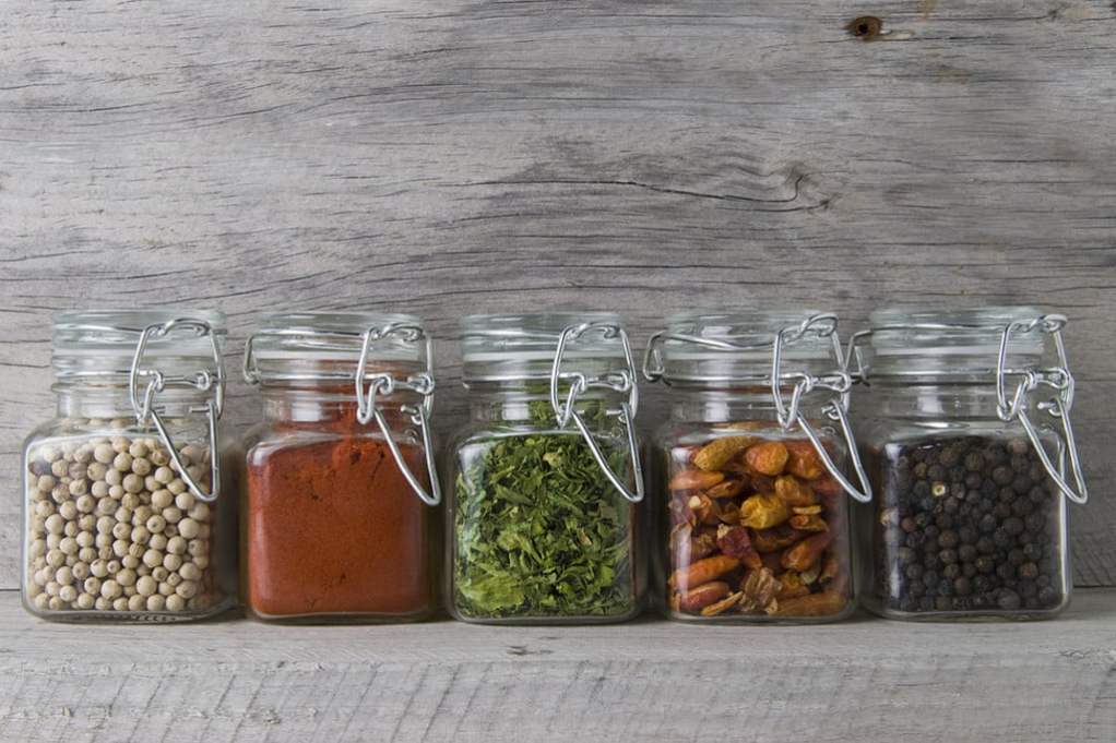 glass spice jars in a row