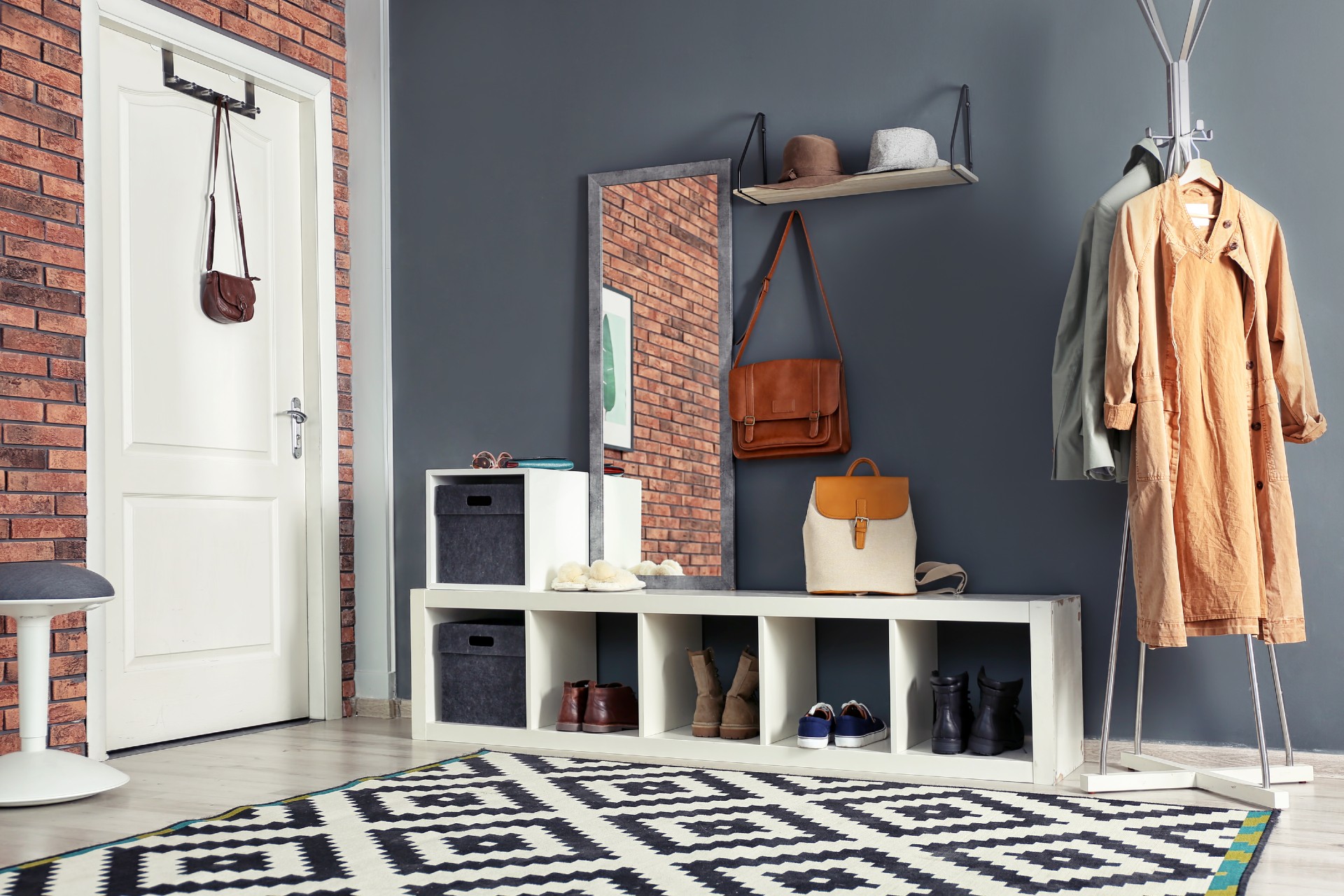 entryway with geometric rug