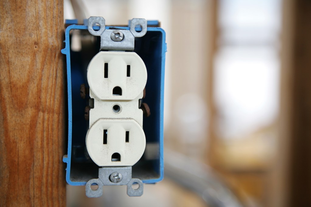 exposed power outlet during home construction