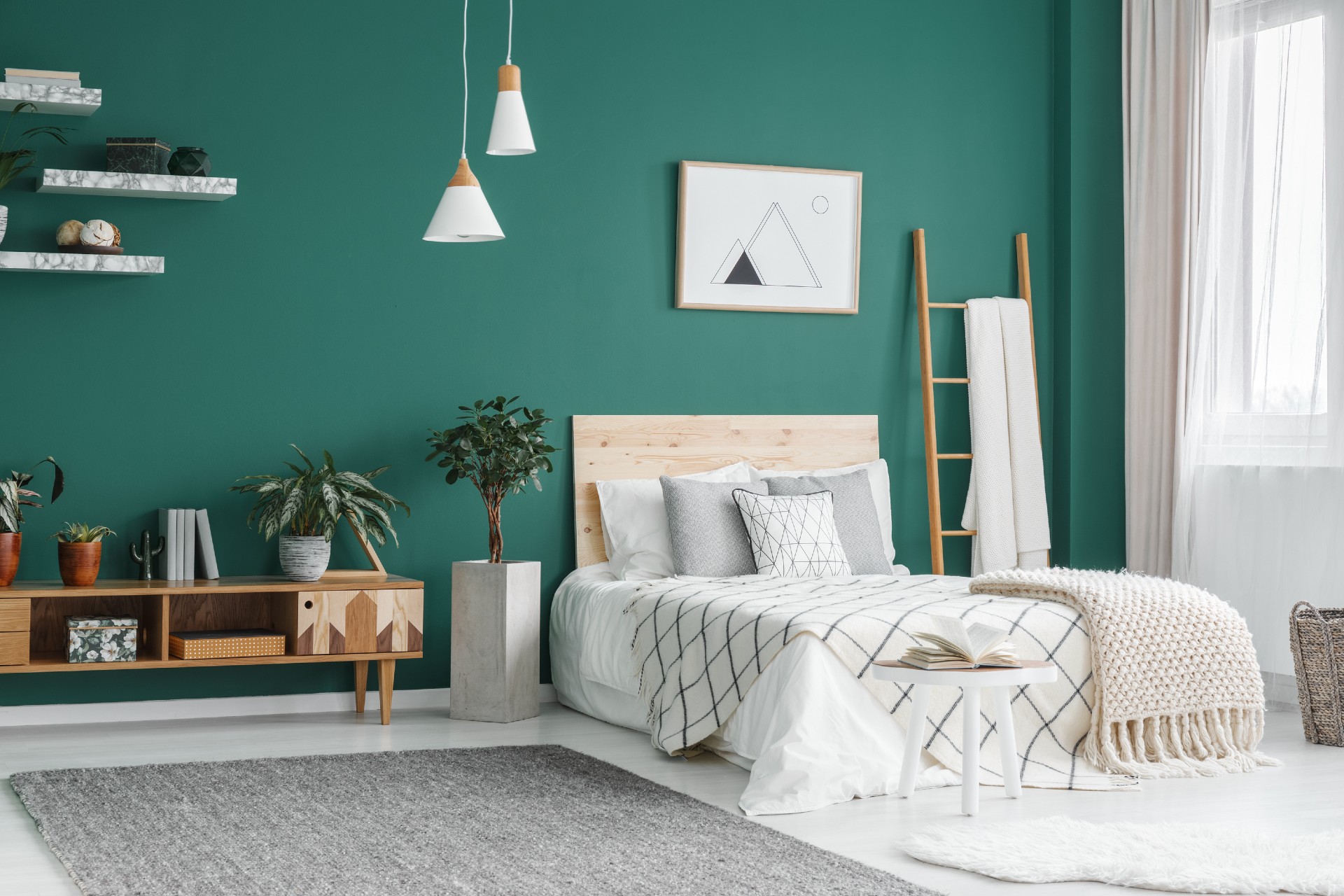 green bedroom with headboard