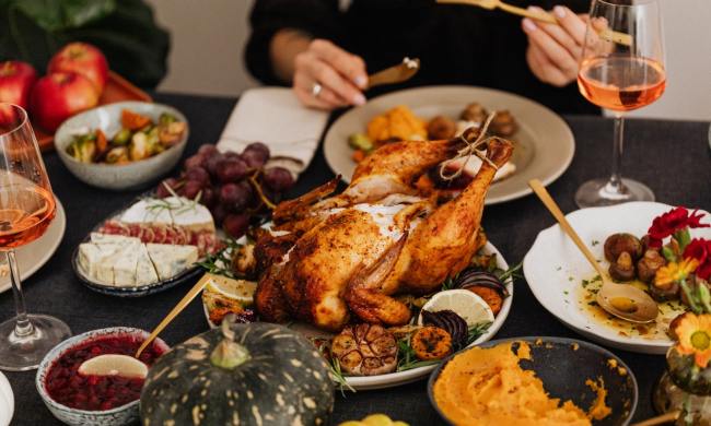 Roasted turkey and side dishes on a table