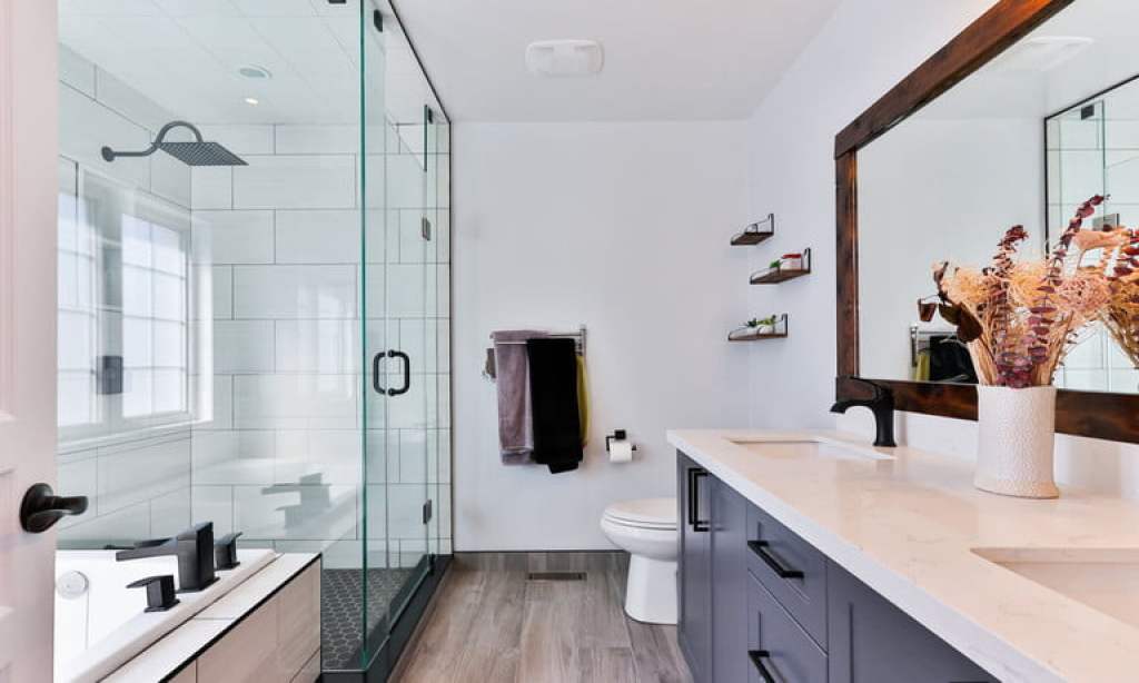 Industrial farmhouse bathroom with shower and tub