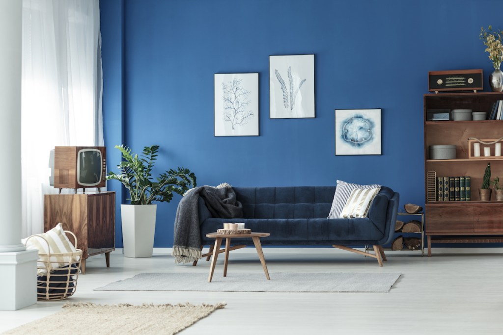 Vintage-style living room with blue wall paint