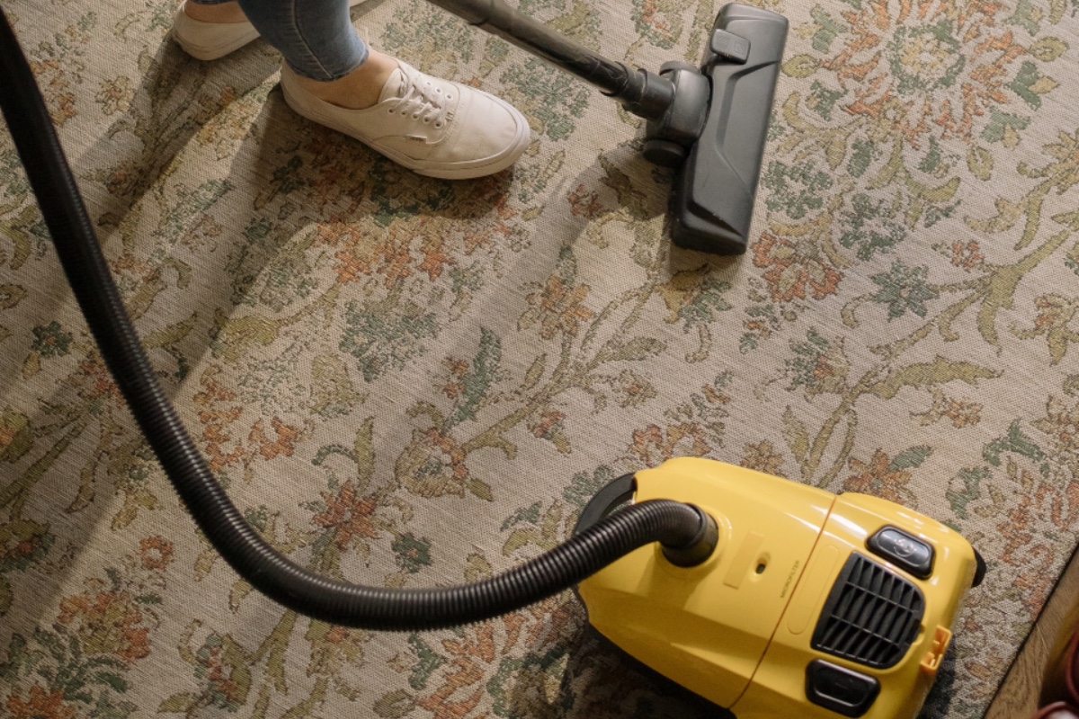 vacuuming floor