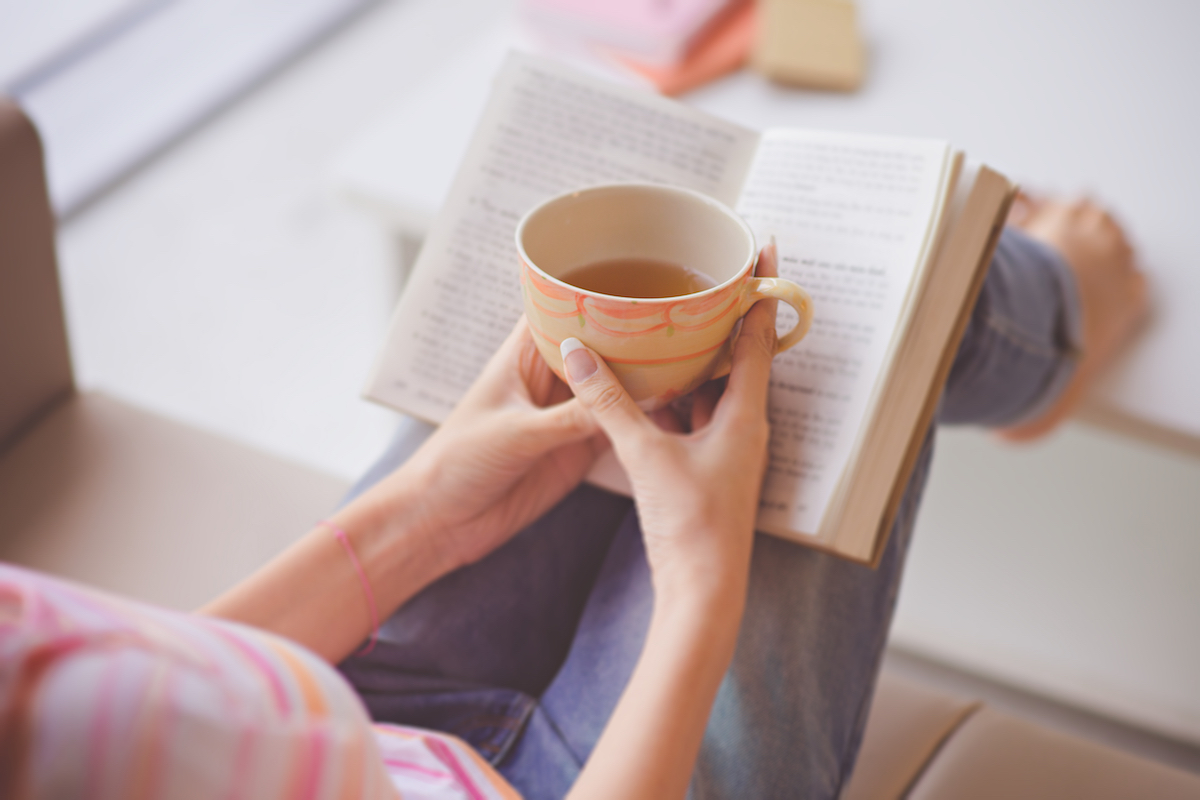 woman reading book