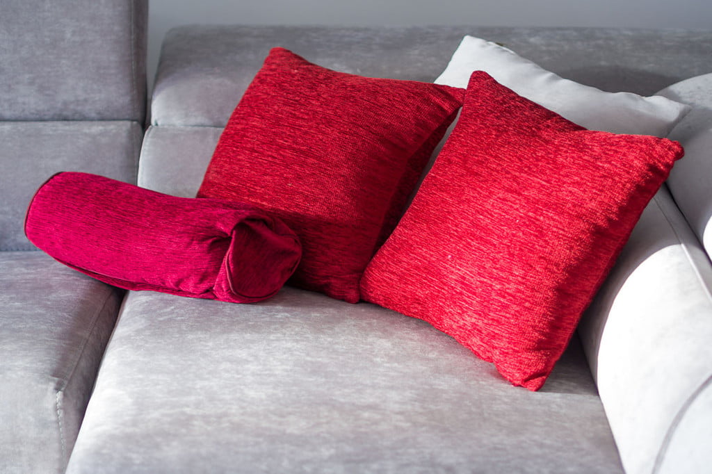 Red and magenta throw pillows