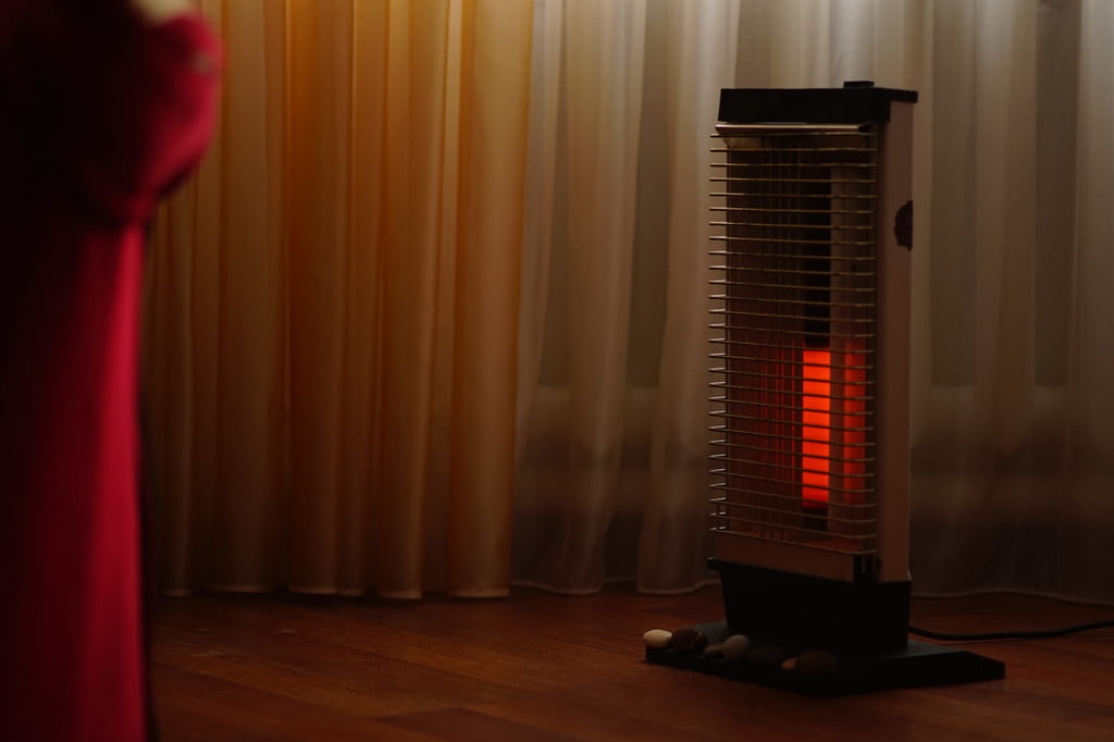slim tower heater in room