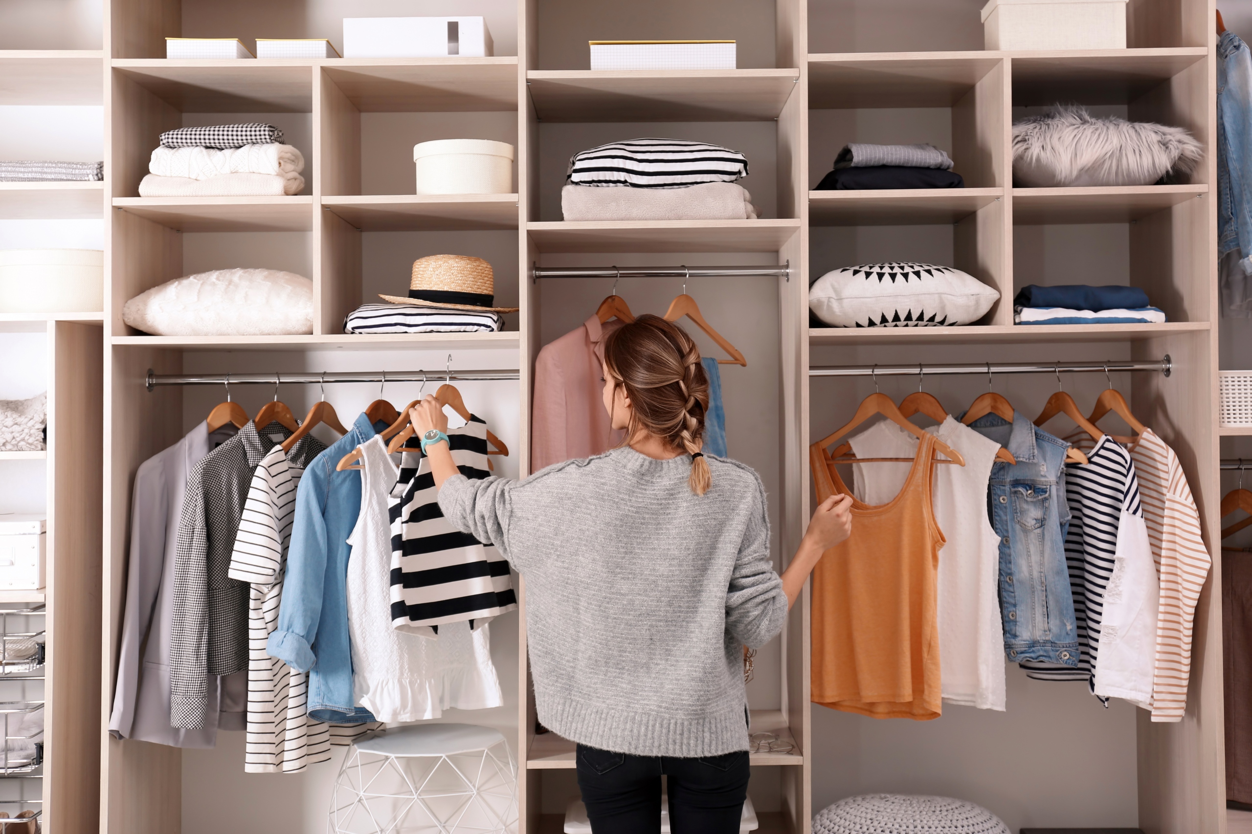 woman organizing closet