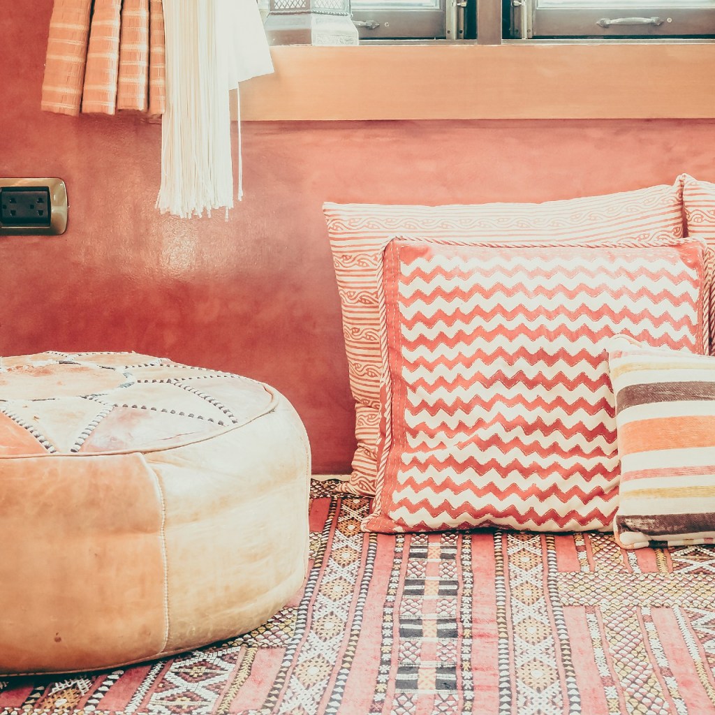 Close up of pillows and pouf