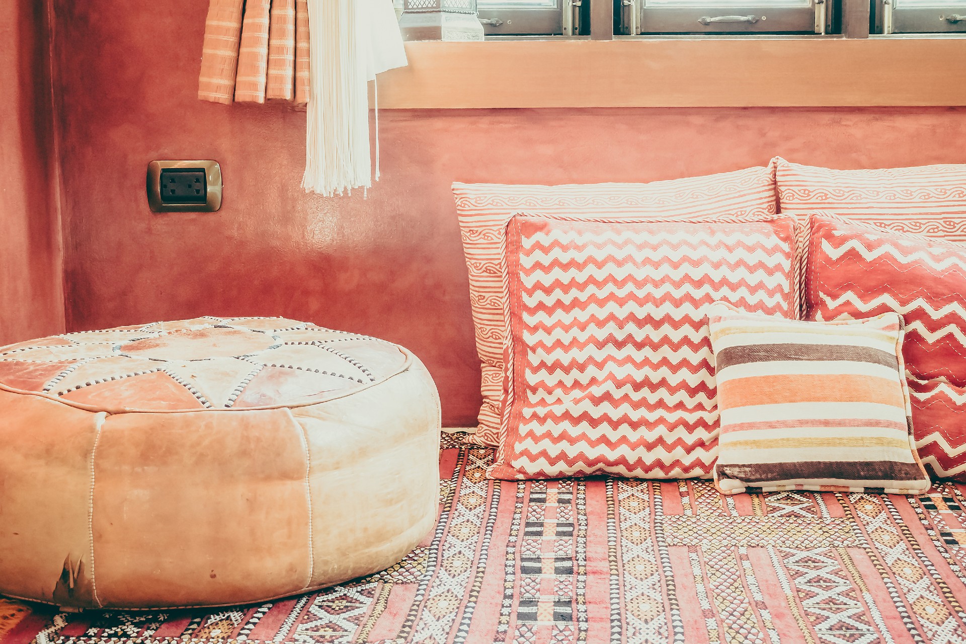 Close up of pillows and pouf