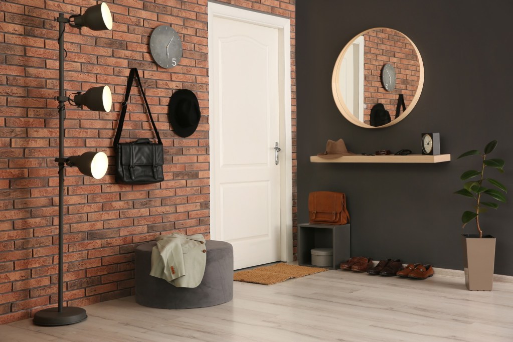 Entryway with round mirror
