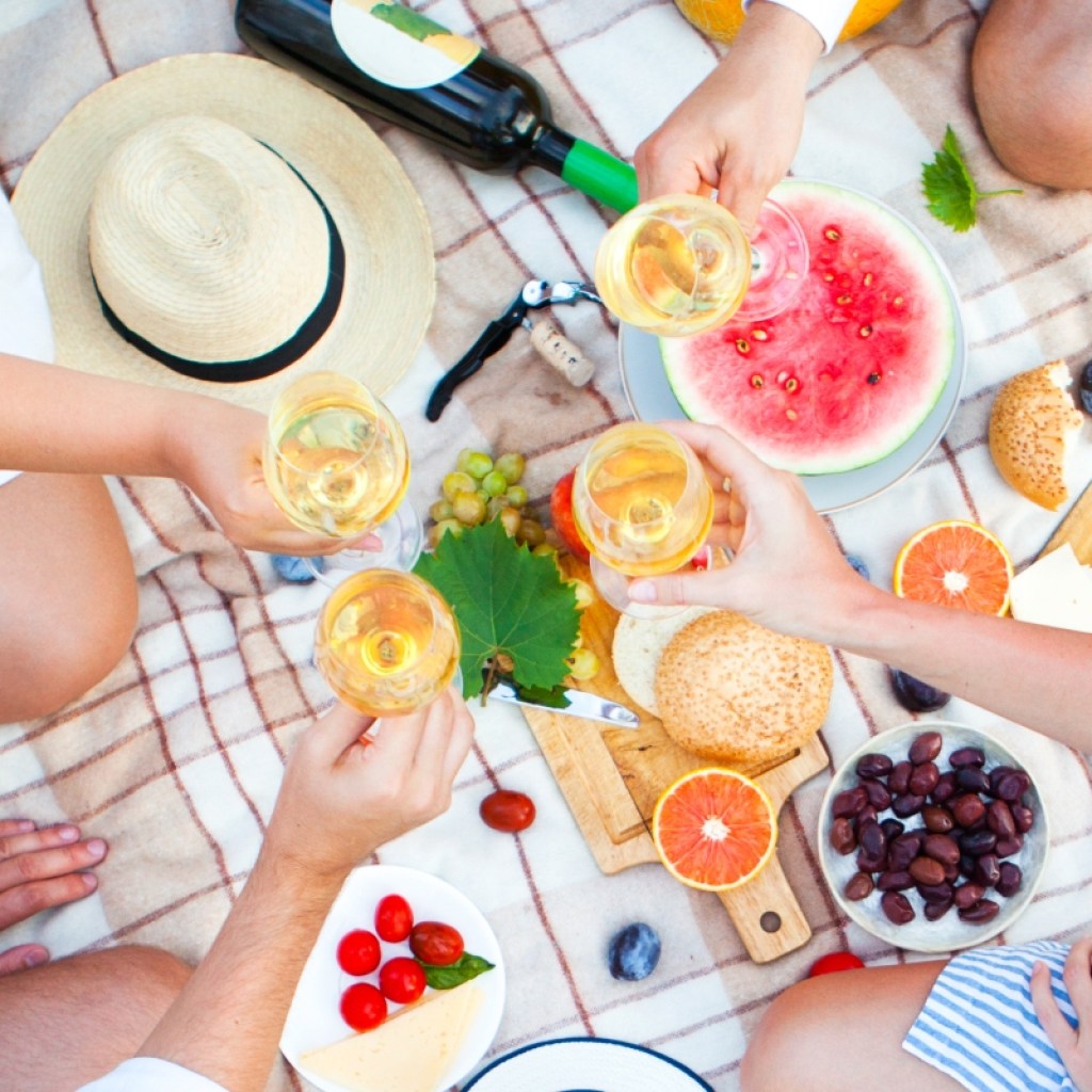 summer picnic party with fruits and drinks