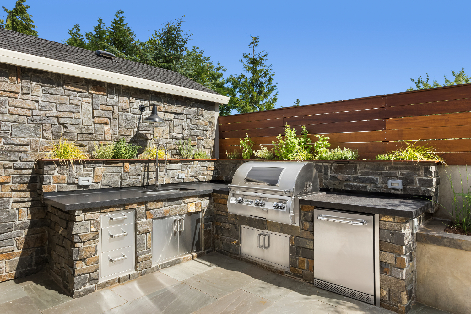 custom stone outdoor kitchen design
