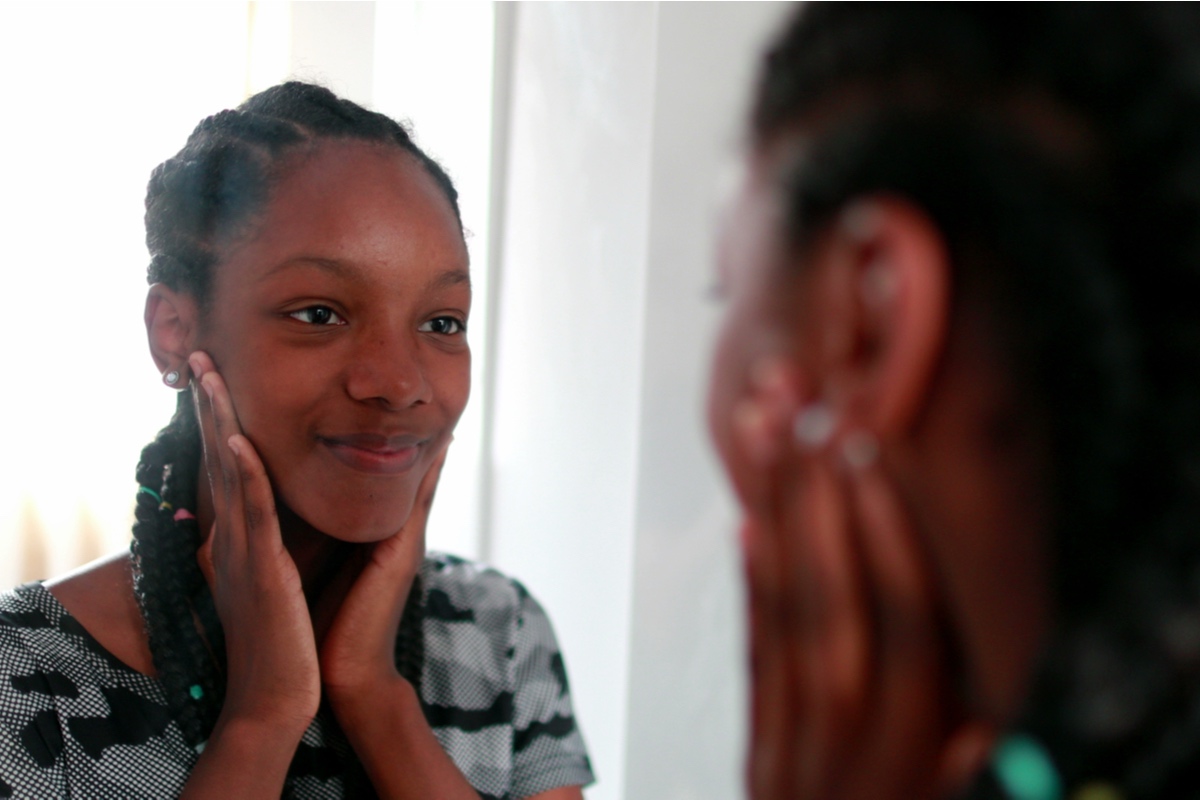 Young woman doing skin care