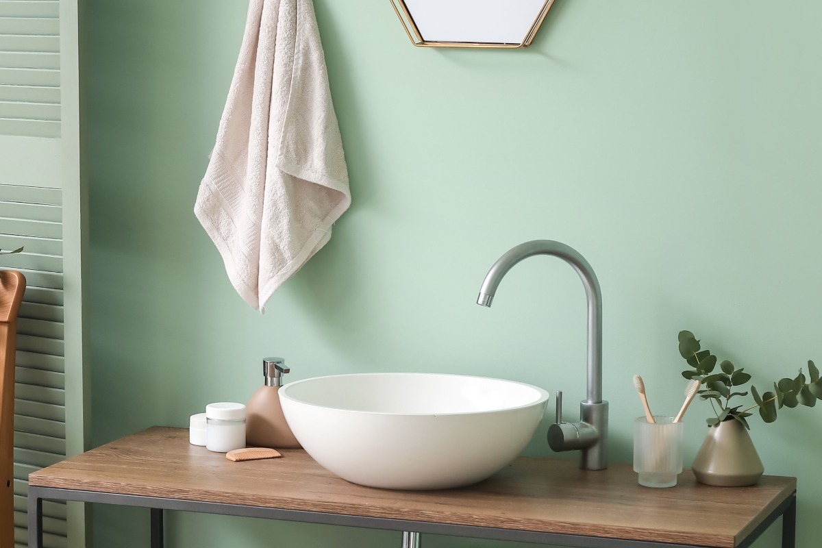 bright modern bathroom with a blue wall