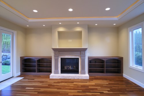 recessed lights above a fireplace