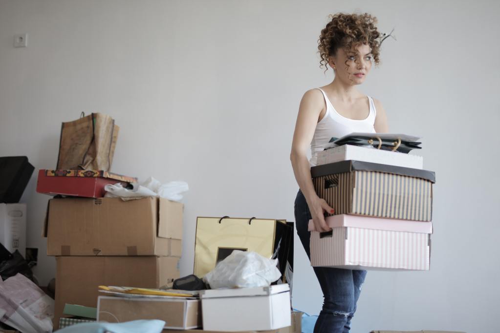 Woman decluttering her house