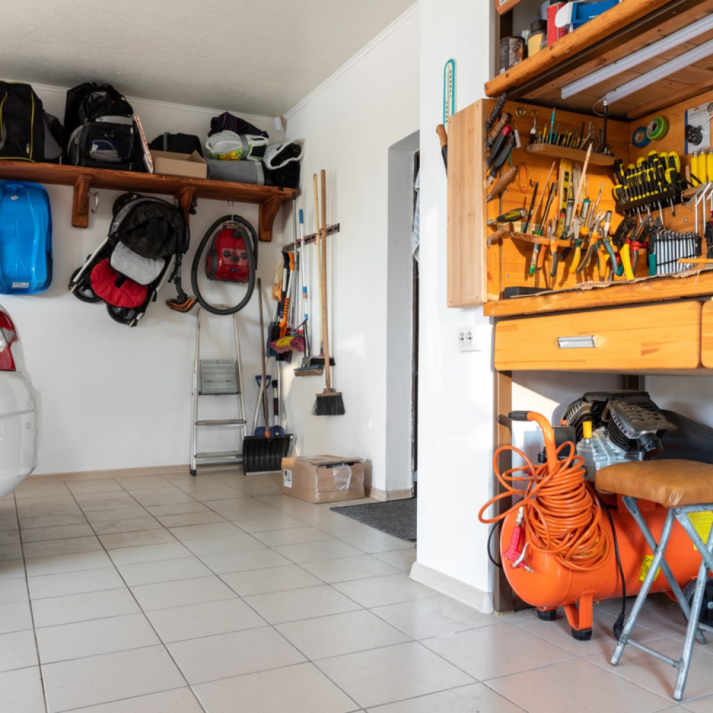 Garage interior with car and tool bench