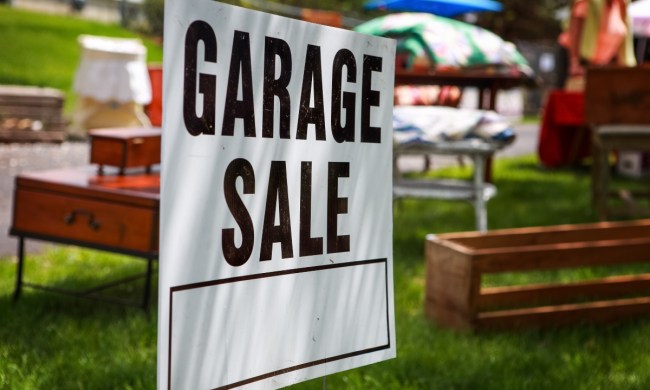 Garage sale sign in front yard