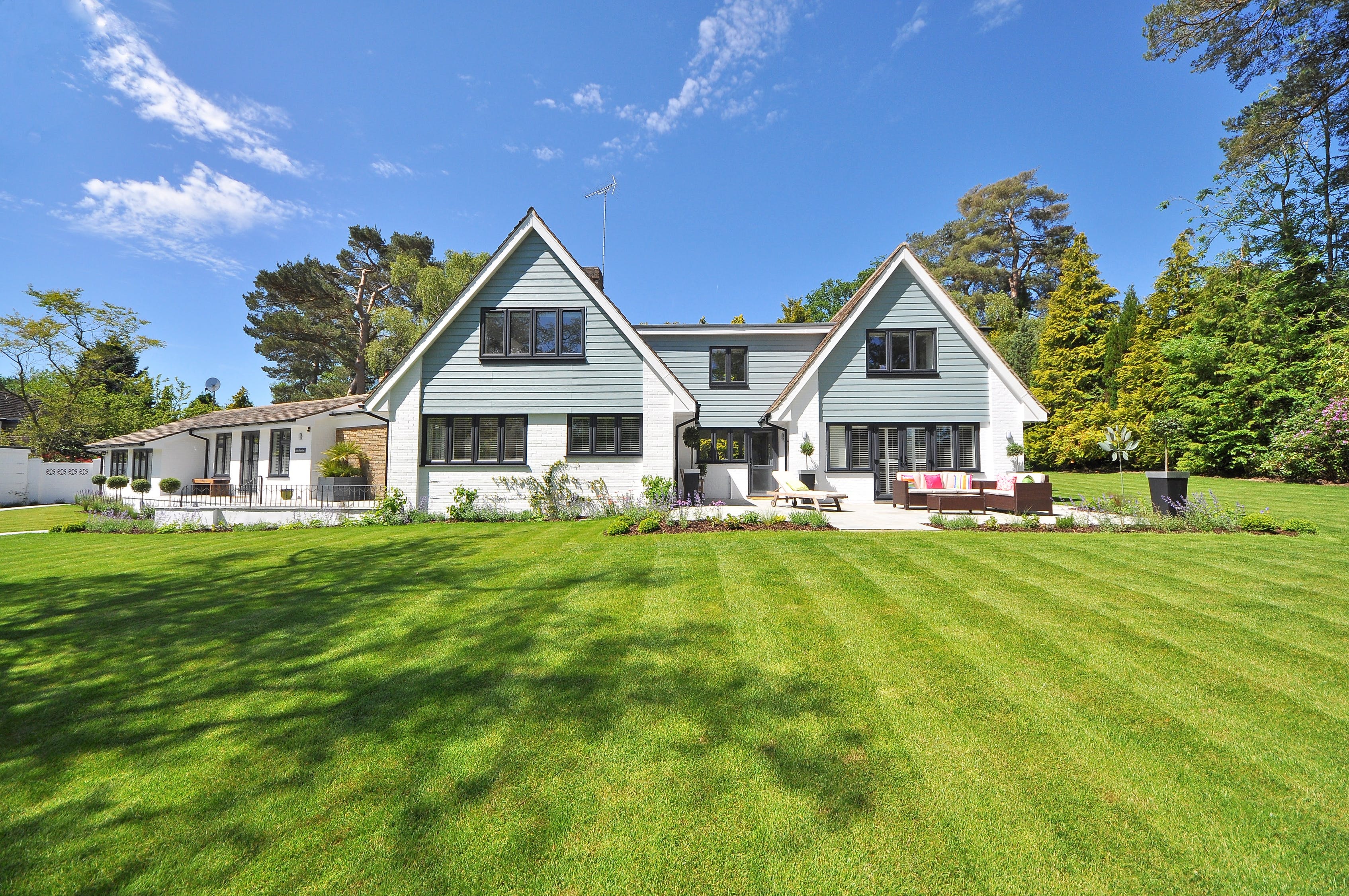 house with green lawn