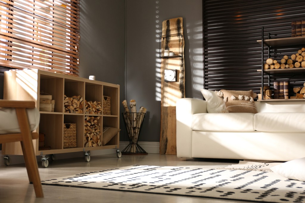rustic living room design with firewood on shelf