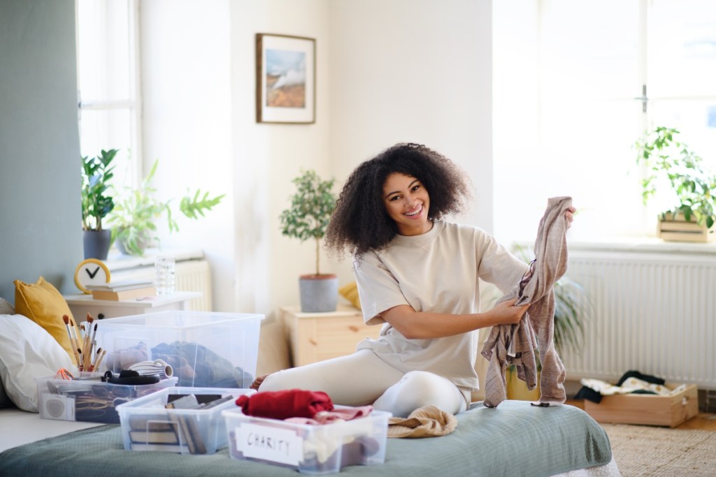 Woman organizing her summer clothing