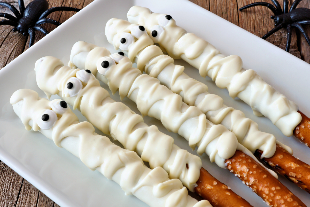 White chocolate dipped mummy pretzel rods
