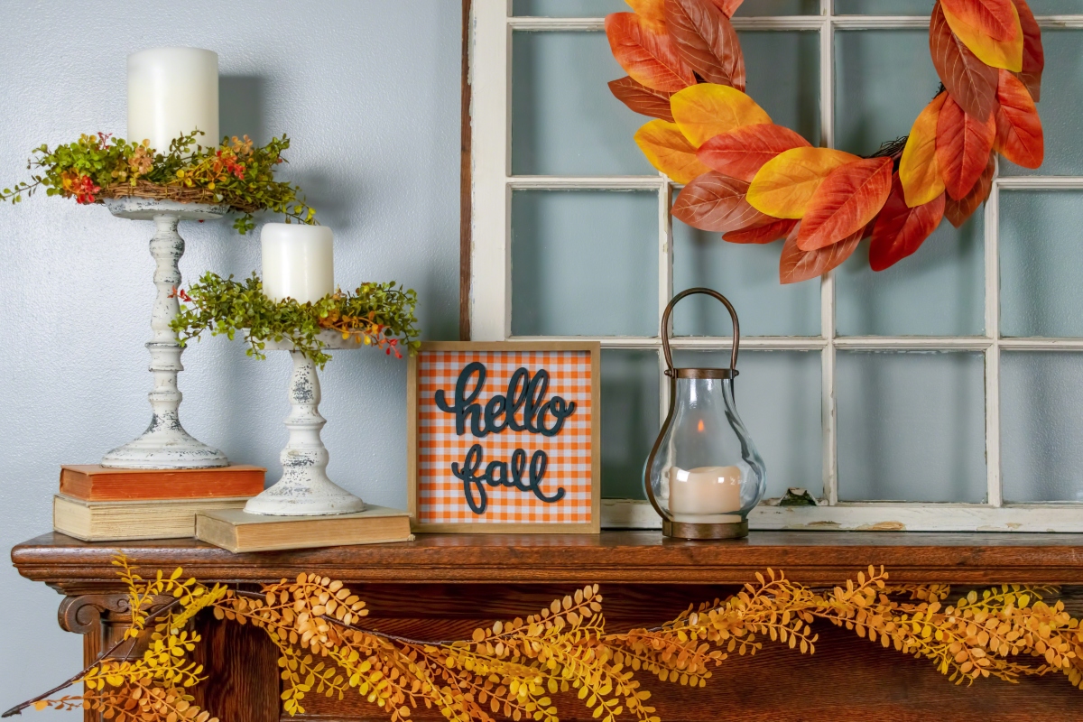 fall mantel decor with sign and candles