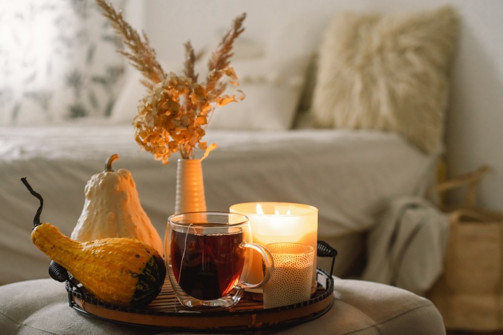 Hygge fall decor with candle and tray