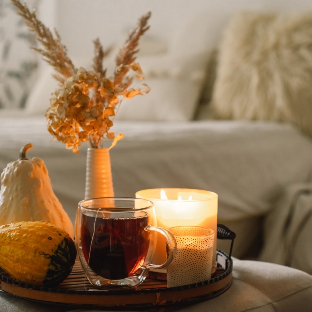 Hygge fall decor with candle and tray