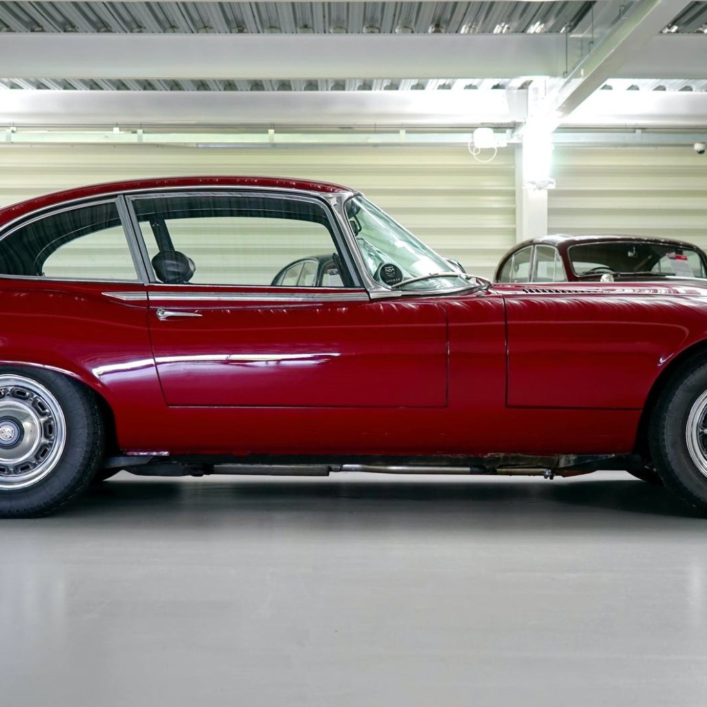 red classic car in garage