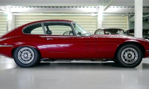 red classic car in garage