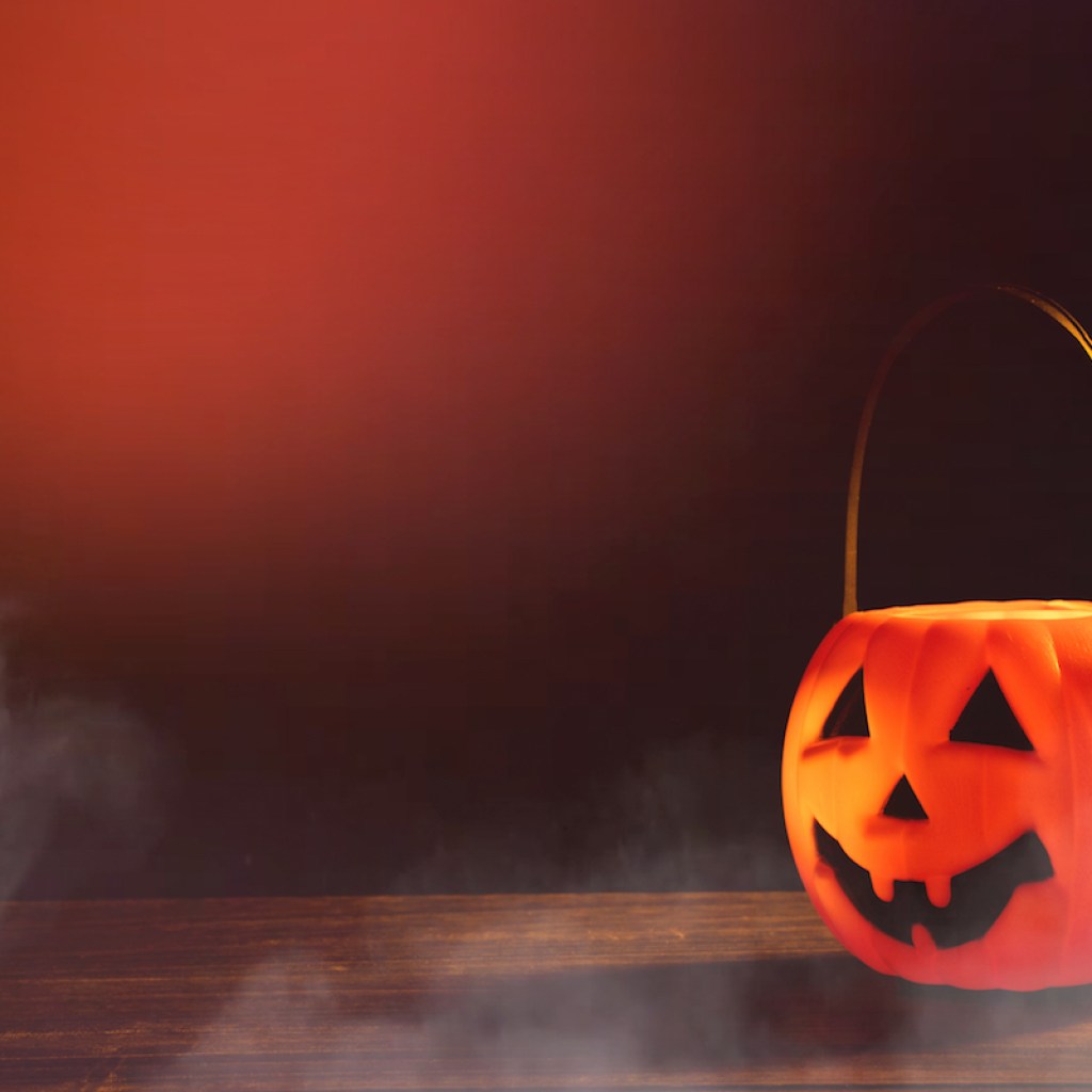 Spooky scene with plastic pumpkin