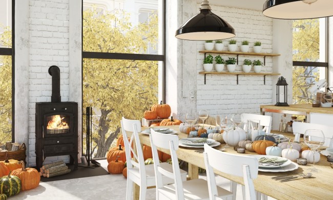 White dining room decorated for fall