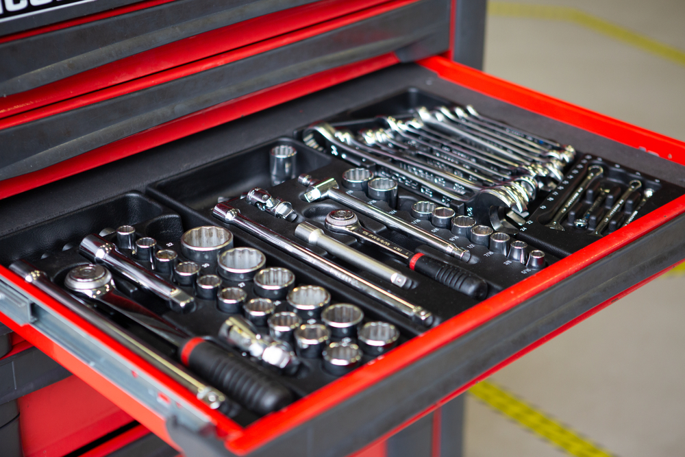 Open tray of toolbox with tools