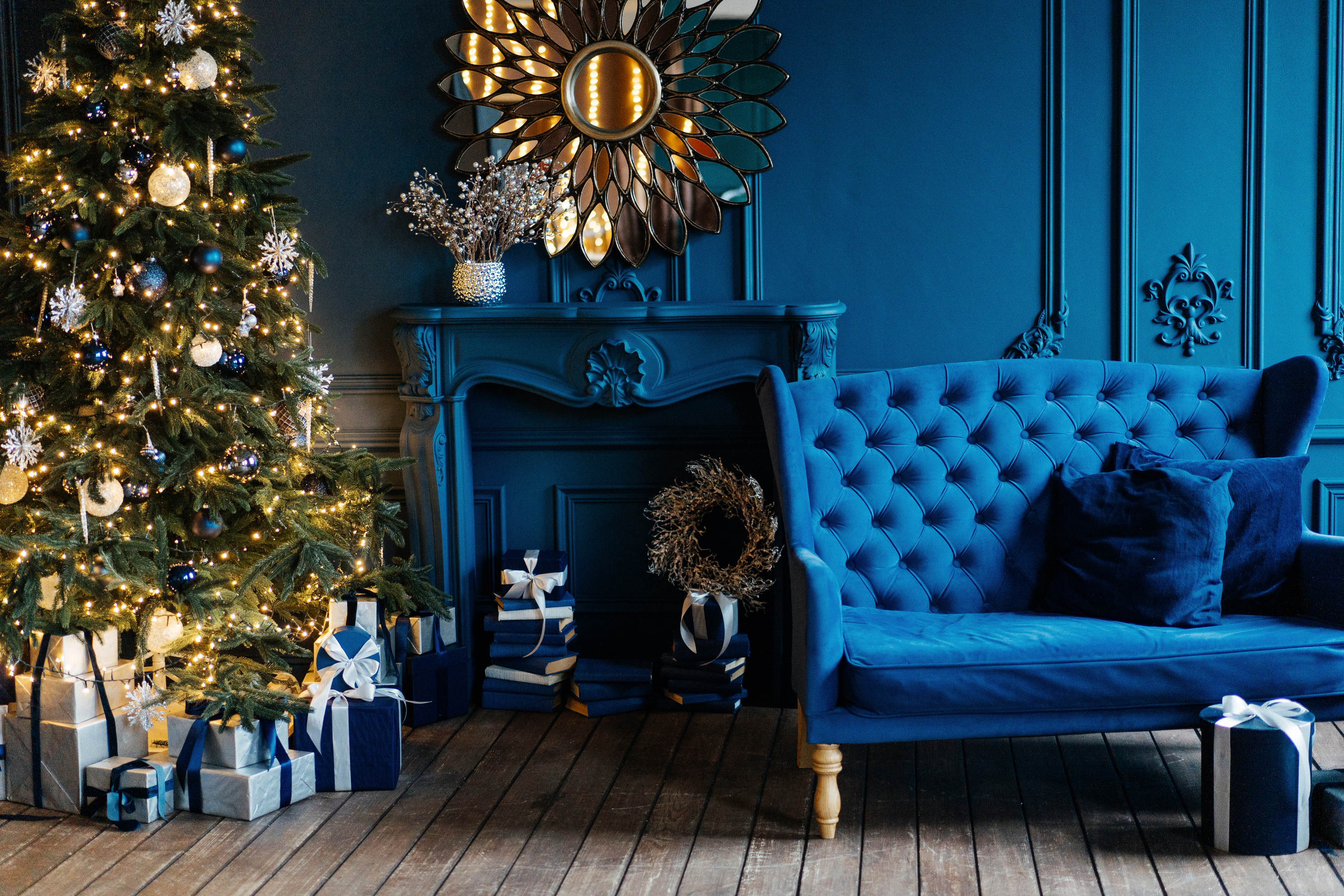blue room design with white and gold christmas decor