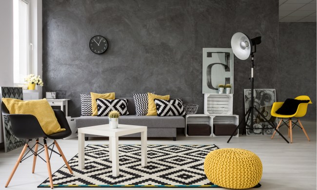 Modern living room with gray walls and yellow furniture