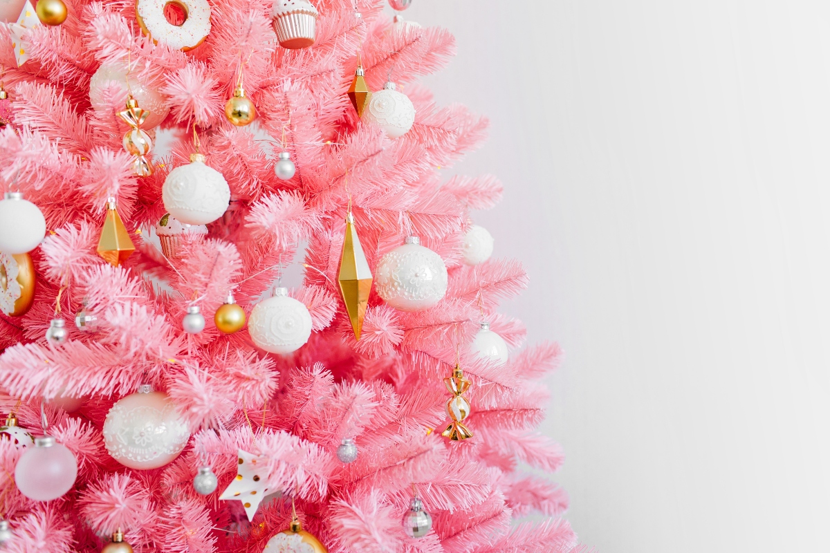pink christmas tree with gold ornaments