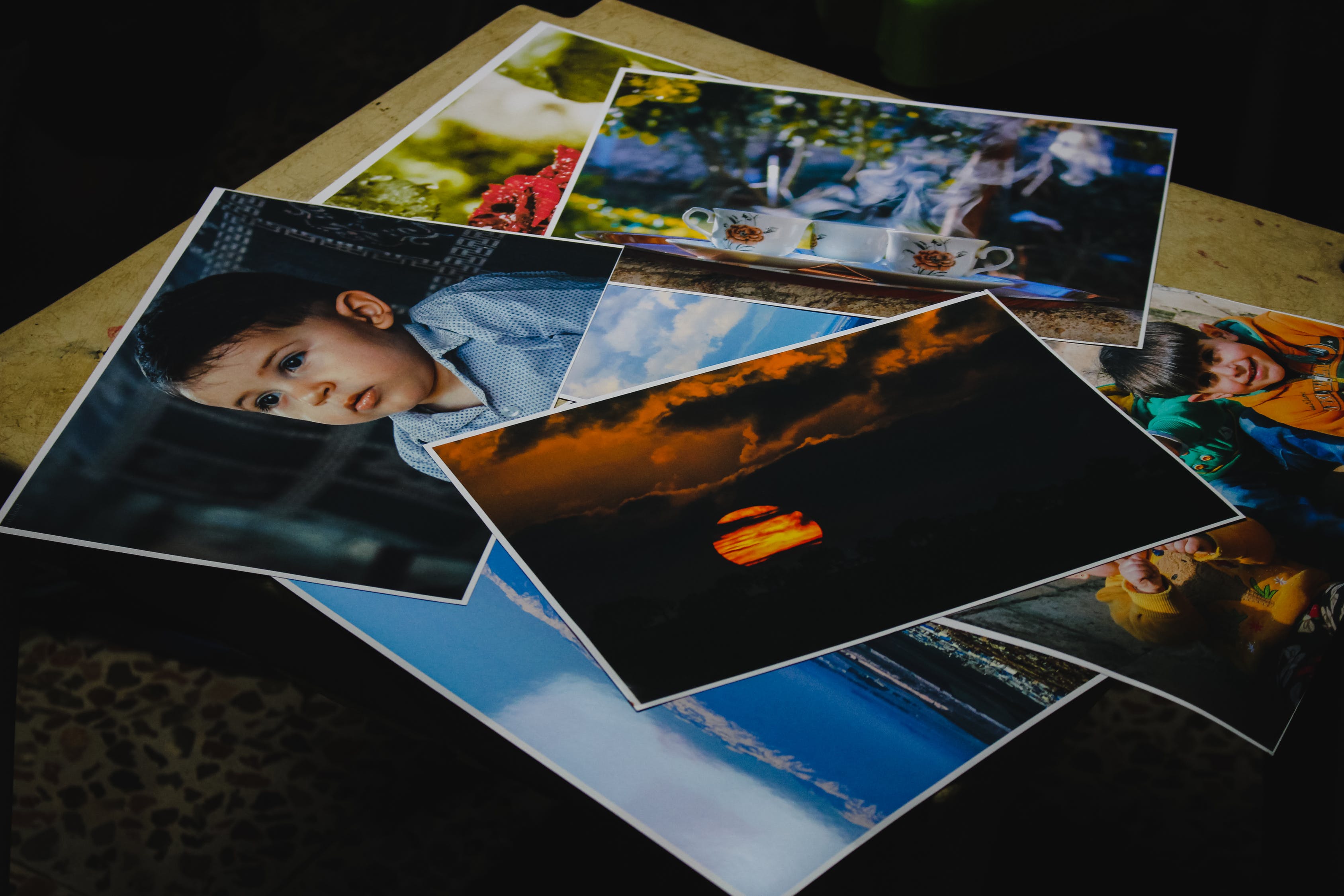 printed photos on table