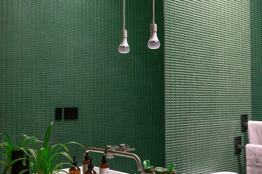 bathroom with green wall
