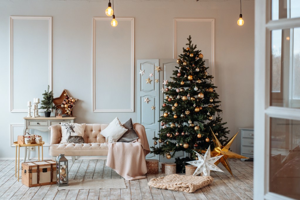 christmas tree with stars in pastel living room