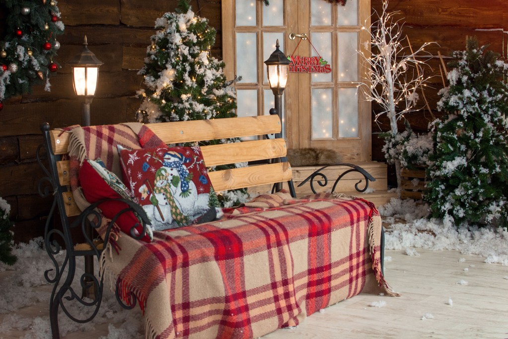 Cozy winter porch bench and decor